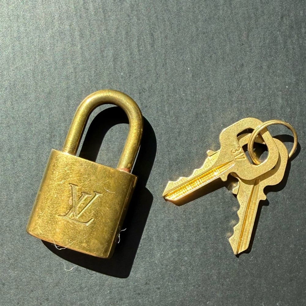Vintage LV lock with keys to open! Rare to have 2 keys!